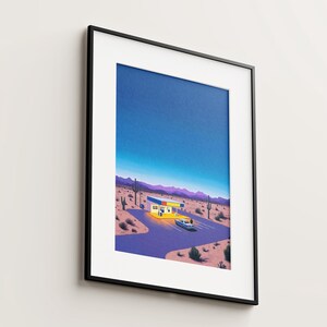 May include: A framed illustration of a desert landscape with a yellow and blue building, a car, and a starry night sky.