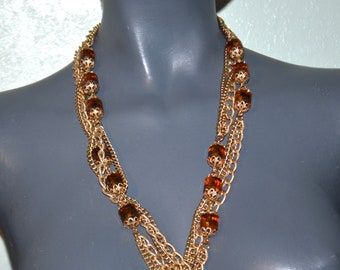 1970s Sarah Cov multi strand golden lantern bead chain necklace.  Versatile.  Long necklace. signed.