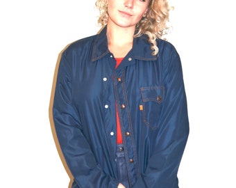 Vintage Levis Rain jacket slicker. work wear street wear. Dark Blue Orange tag.  Made in the USA.  Unisex Large.  see description.