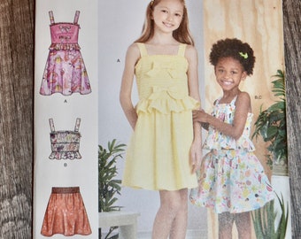 R11461 Simplicity pattern Girls dress top and skirt.  Ruffled halter. bows.  7 through 14.  uncut factory folds. 2022.