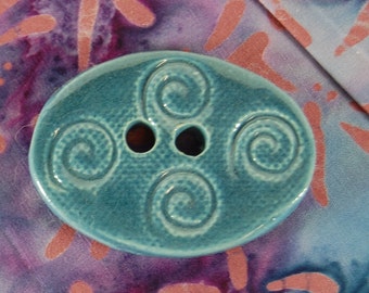 Oval Pottery Button B03 Deep Blue Swirls Swirls Swirls Galore