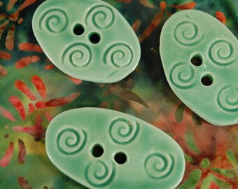 Mint Green Oval Pottery Button B51 Swirls Swirls Swirls Galore