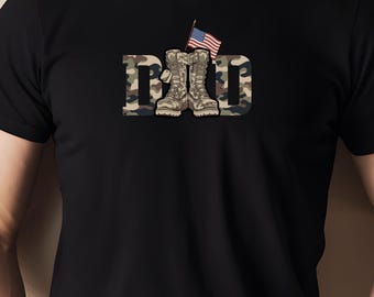 May include: Black t-shirt with the word "DAD" in a camouflage pattern. The "A" is replaced with a pair of military boots and a small American flag.