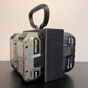 May include: A black Ryobi battery holder with a handle, holding four 18V Lithium 4Ah batteries. The Ryobi logo is visible on the side of the holder. The batteries are gray and black.