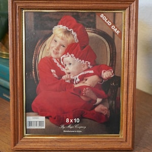Vintage 8x10 inch Solid Oak photo frame by the Mayre Company.