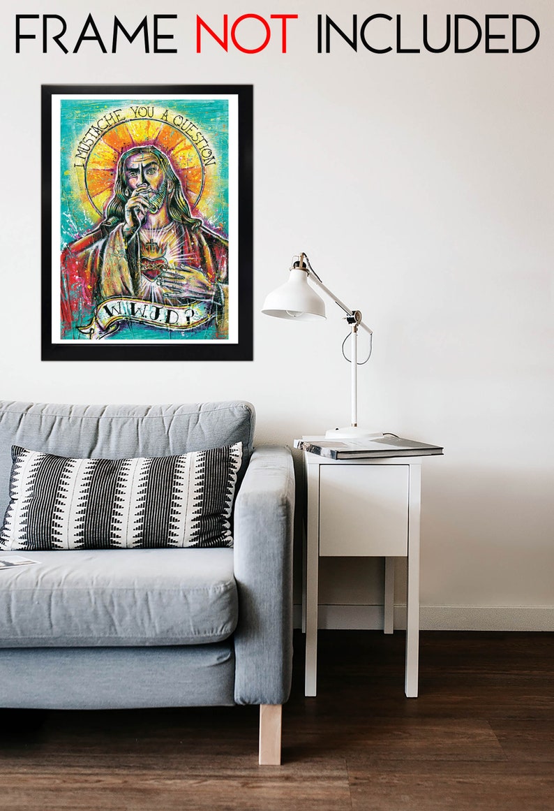 May include: A framed print of a colorful painting depicting a man with a beard and long hair, holding a microphone and wearing a red robe. The text "I MUSTICHE YOU A QUESTION" is written in a circle around the man's head. The text "WILL YOU?" is written below the man.
