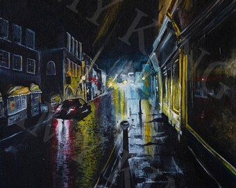 May include: An oil painting depicts a rainy night scene in a city. The street reflects the lights of buildings and a car. The artwork features dark blues, blacks, yellows, and reds, with the artist's signature in the bottom right corner.