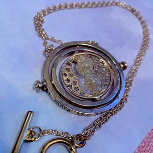 LIQUIDACIÓN Collar de viaje en el tiempo de mago o bruja reloj de arena hechizo mágico regalo de Navidad presente