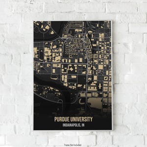 May include: A framed map print of Purdue University in Indianapolis, IN. The map features a black and gold colour scheme, with detailed street and building outlines. The text "PURDUE UNIVERSITY INDIANAPOLIS, IN" is at the bottom.