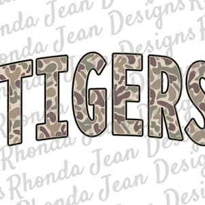 May include: The word "TIGERS" in a camouflage pattern font.
