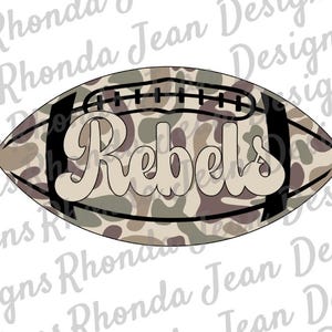 May include: A brown and green camouflage patterned football with the word "Rebels" in a tan color.