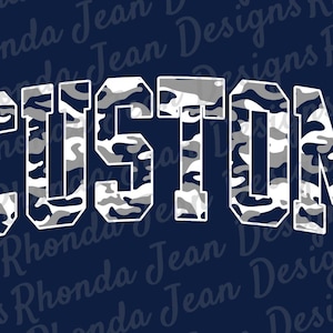 May include: The word "CUSTOM" in a white, block letter font, filled with a gray, white, and navy blue camouflage pattern. The background is a dark blue with the text "Rhonda Jean Designs" in a script font.