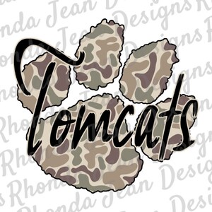 May include: A camouflage paw print design with the word "Tomcats" written in black cursive lettering.