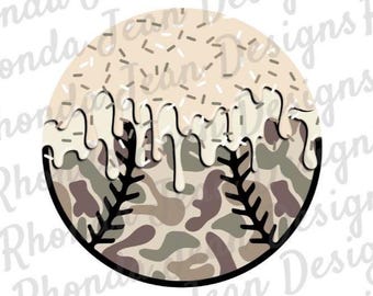 May include: A baseball with a camouflage pattern and white icing dripping down the sides. The icing is decorated with white sprinkles.