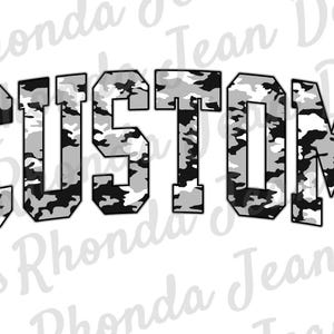 May include: The word "CUSTOM" in a bold, arched font. The letters are filled with a grayscale camouflage pattern, outlined in black, and set against a white background. The design has a collegiate or athletic aesthetic.