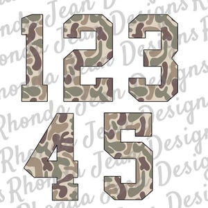 May include: Five numbers, 1 through 5, in a camouflage pattern. The numbers are in a white outline and are in a bold, blocky font.