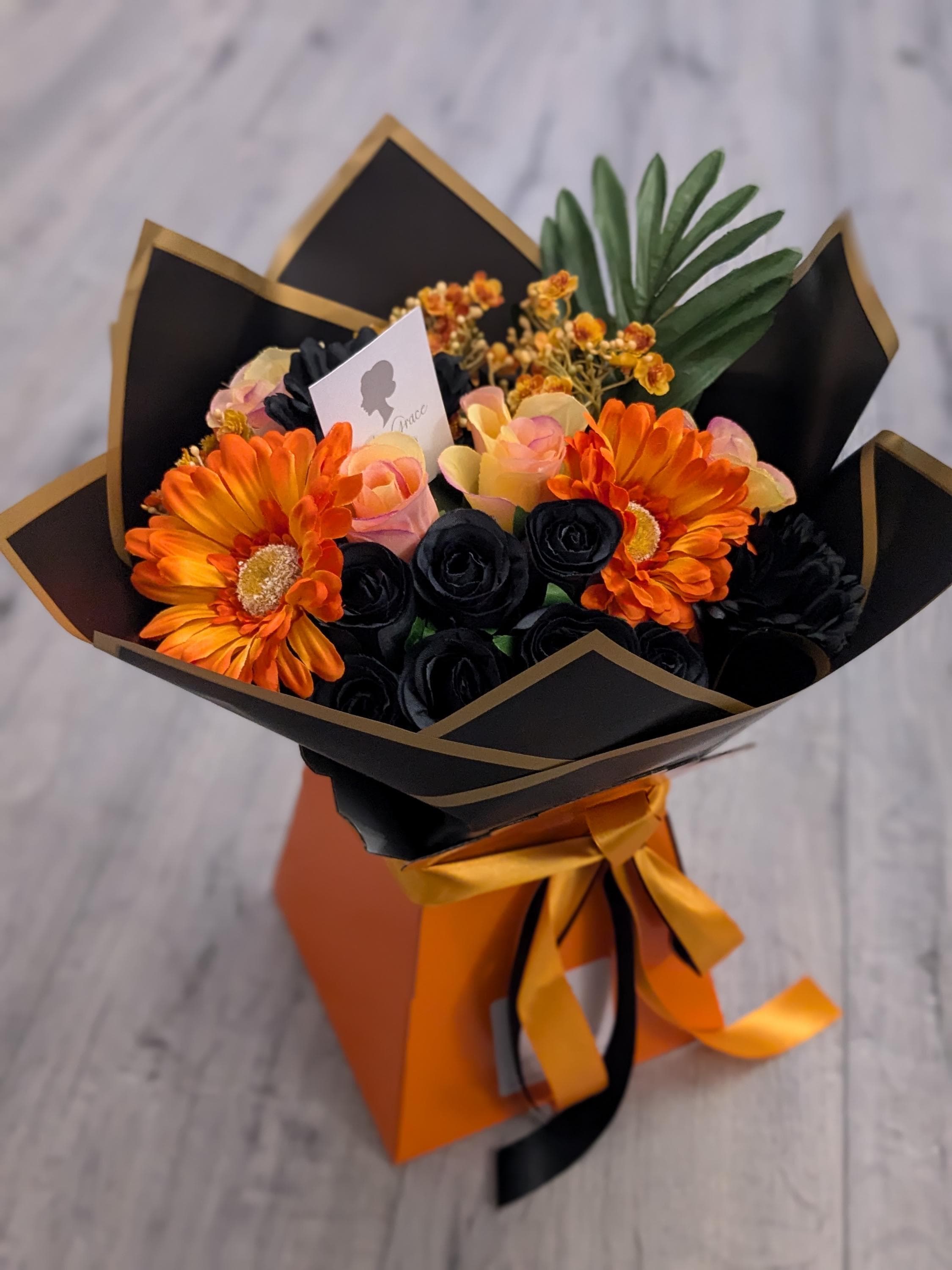 Handtied Bouquet Silk Flowers Orange/Black - Gift Hamper