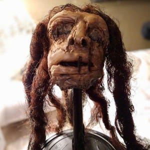 Shrunken head sculpture