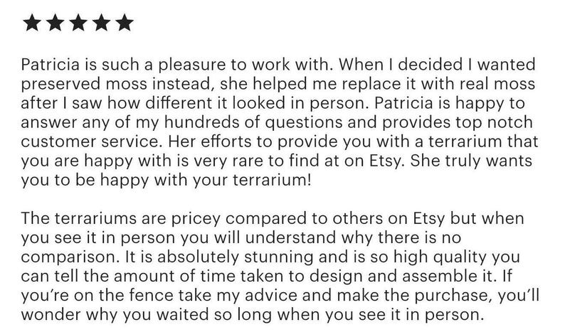 May include: A white ceramic mug with a black handle and the text "But First, Coffee" in a handwritten style. The mug is on a white surface. The mug is approximately 4 inches tall.