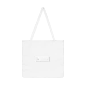 May include: A white tote bag with two long shoulder straps. Centered on the front is a rectangular black outline containing the text FP_ on the left and BUILT DIFFERENT_ on the right, both printed in a simple, clean, black sans-serif font.