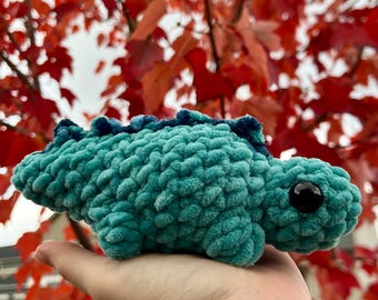 Estegosaurio de bolsillo a crochet, compañero dinosaurio de bolsillo