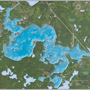 May include: Detailed map of Tomahawk Lake, Wisconsin, showing the lake's contours, surrounding forests, and points of interest. The map includes text indicating the lake's size, depth, and features like boat landings and campsites.