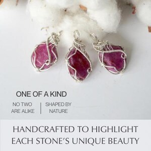 May include: Three wire-wrapped pendants featuring raw, deep pink stones secured in silver-toned metal wire. The image includes the text: ONE OF A KIND, NO TWO ARE ALIKE, SHAPED BY NATURE, HANDCRAFTED TO HIGHLIGHT EACH STONE'S UNIQUE BEAUTY.