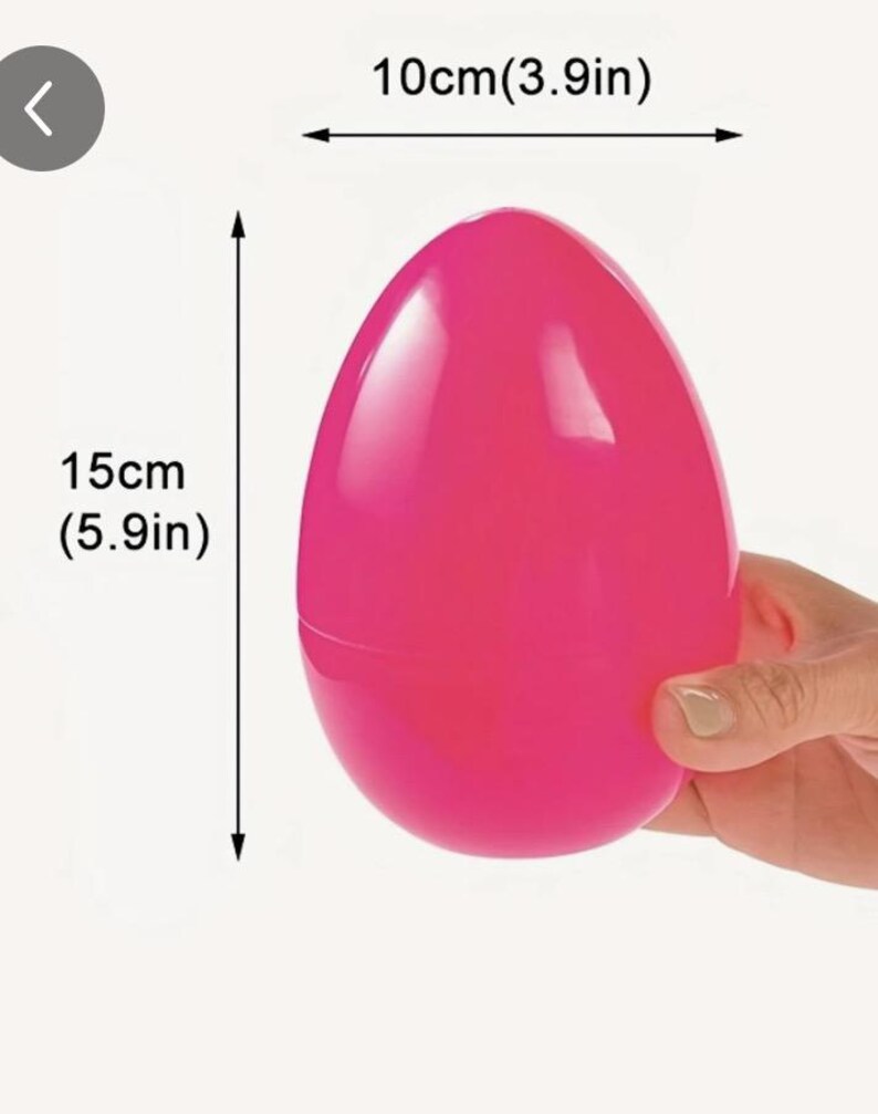 May include: A bright pink plastic Easter egg measuring 10cm (3.9in) wide and 15cm (5.9in) tall.