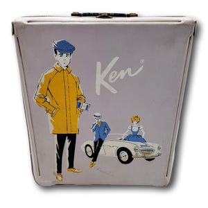 May include: A vintage, pale purple Ken lunchbox with illustrations of a man in a yellow coat, a man in a blue suit, and a woman in a blue dress. The lunchbox has a silver zip and a black handle.