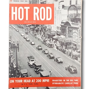 May include: Vintage "Hot Rod" magazine cover from March 1951. The cover features a black and white photo of a street lined with classic cars racing down the road. The magazine title "HOT ROD" is in large white letters on a red background.