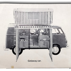 May include: Black and white illustration of a vintage camper van with a striped pop-up roof and awning. The van has a ladder, curtains, and a small kitchen setup. The text "Getaway car" is at the bottom.