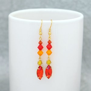 Earrings on fire  - Swarovski Sun, Indian red, and Siam with hyacinth and vintage moonstone