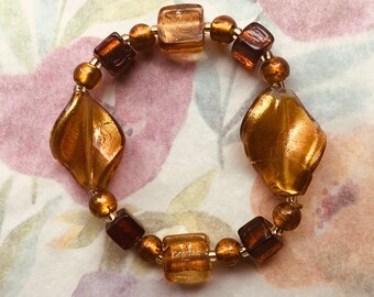 Pte-104 Bracelet golden ochre brown glass beaded stretch 7  5/8 inches