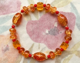 Pte-111 Bracelet yellow orange red  gold fire stretch 8 in