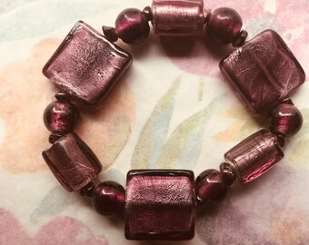 Pte-108 Bracelet deep purple chunky lampwork beaded stretch 7 3/4in. Fred Shipping.