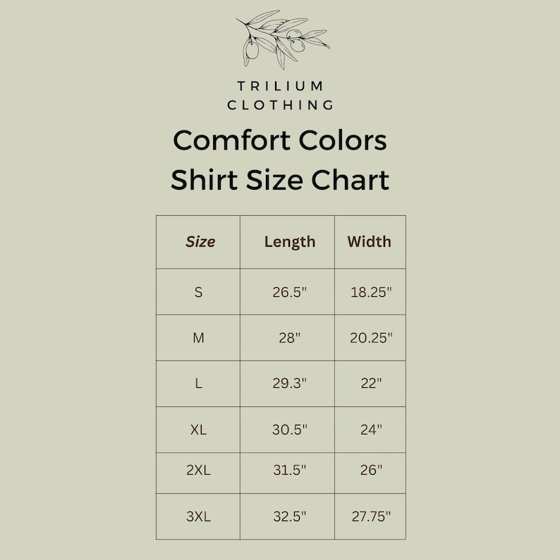 Puede incluir: Una tabla de tallas de camisas Comfort Colors de Trilium Clothing sobre fondo verde claro. La tabla enumera las tallas de S a 3XL con las medidas de largo y ancho en pulgadas. Una peque&ntilde;a ilustraci&oacute;n de una rama de olivo aparece arriba.