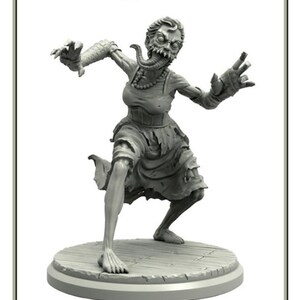 Puede incluir: Una figura gris de Wraith, posando en una postura agachada dinámica. La figura tiene una apariencia grotesca, como de zombi, con dientes expuestos, un apéndice largo en forma de tentáculo y ropa hecha jirones. La figura está sobre una base circular, con la palabra "WRAITH" arriba.