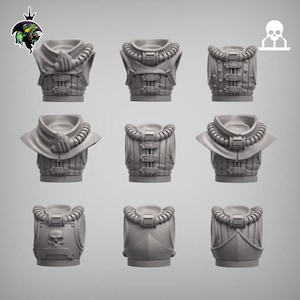 May include: Nine 3D printed plastic models of different styles of armour for tabletop gaming. The models are grey and feature various details, including straps, buckles, and a skull.