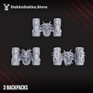 May include: Three grey 3D-printed backpacks with a fantasy design. Each backpack features cylindrical components and a central dragon-like emblem. The text "3 BACKPACKS" is at the bottom, and the store logo "DakkaDakka.Store" is at the top.
