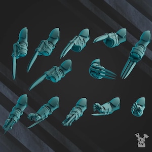 Op de afbeelding: Een set van 12 teal-kleurige plastic miniatuur robotarmen met scherpe klauwen. De armen zijn in verschillende poses, sommige met klauwen uitgeschoven en andere met klauwen ingetrokken.