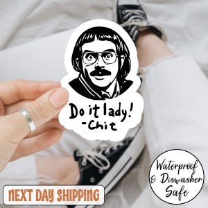 May include: A black and white sticker featuring a cartoon illustration of a man with glasses and a mustache. The sticker has the text "Do it lady! -Chit". The sticker is waterproof and dishwasher safe.