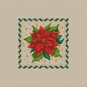 Puede incluir: Diseño de punto de cruz con una flor de pascua roja con hojas verdes, rodeada por un borde dorado y un borde verde y blanco de acebo. Acentos de estrellas doradas sobre un fondo beige.