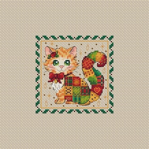 May include: Cross-stitch image of a ginger cat with green eyes, wearing a red bow tie and a patchwork pattern. The cat is framed by a green and gold border with a beige background. The cat's tail is a rainbow of colours.