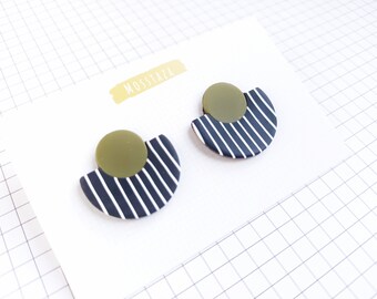 Polymer clay earrings, striped earrings, black and green earrings.