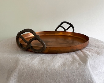 vintage serving tray / copper round tray / circle platter with soft pretzel sculpture handles
