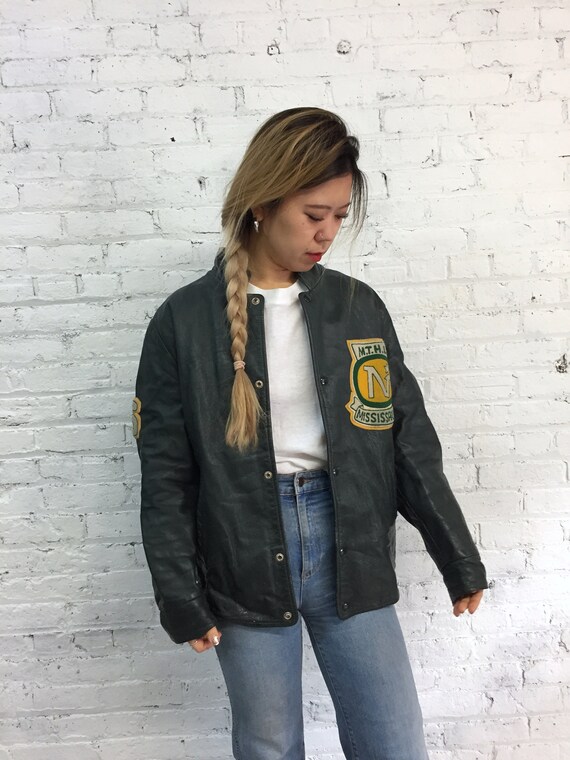 vintage 70s black leather varsity jacket with café