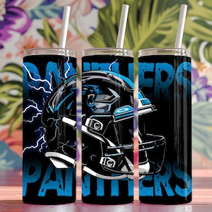 May include: Three black and blue stainless steel tumblers with a Carolina Panthers logo and the words "Panthers" on them. The tumblers are decorated with a lightning bolt design and a football helmet.