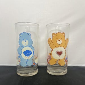Two Vintage 1983 Care Bear Pizza Hut Glasses - Grumpy Bear and TenderHeart Bear