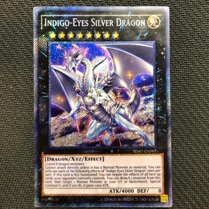 Proxy del Dragón Plateado de Ojos Índigo (Secreto Raro)