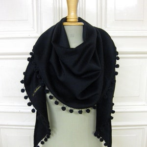 woolshawl with pompons in black image 1